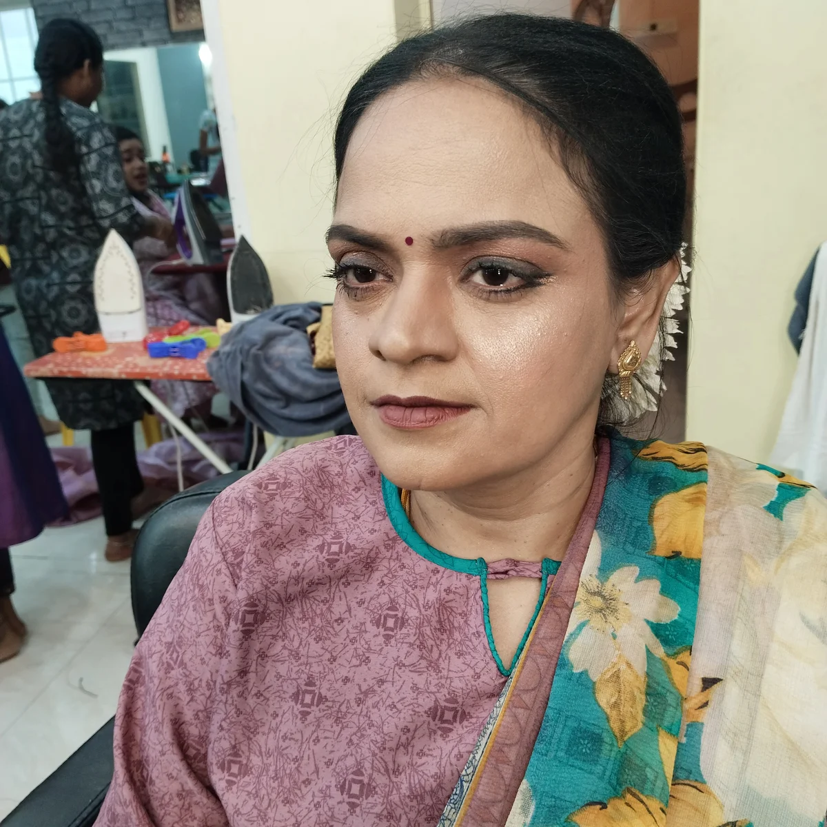 Engagement ceremony makeup with natural glow and soft pink tones for fresh daytime look